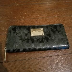 MK woman zip around wallet